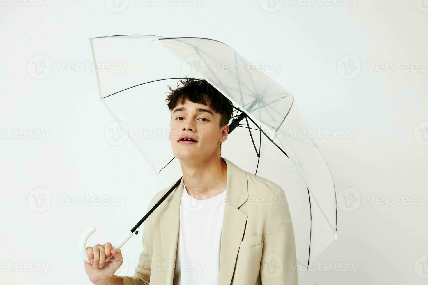 handsome guy rain protection in hand in hand modern style isolated background unaltered photo