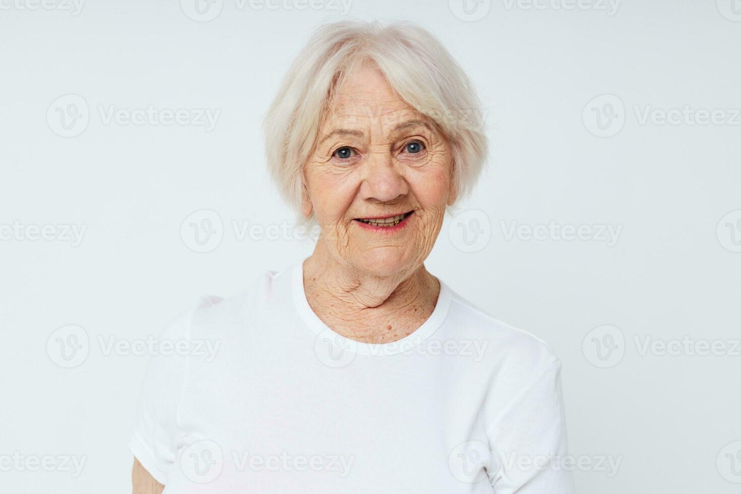 elderly woman white t-shirt studio close-up lifestyle photo