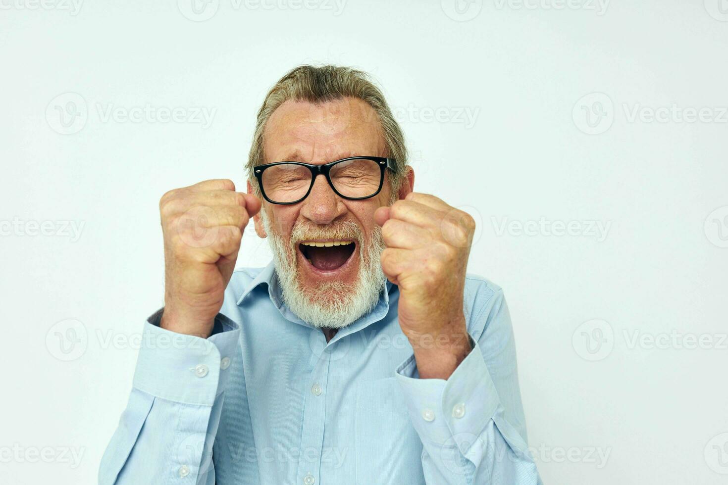 elderly man in shirt and glasses posing emotions isolated background photo
