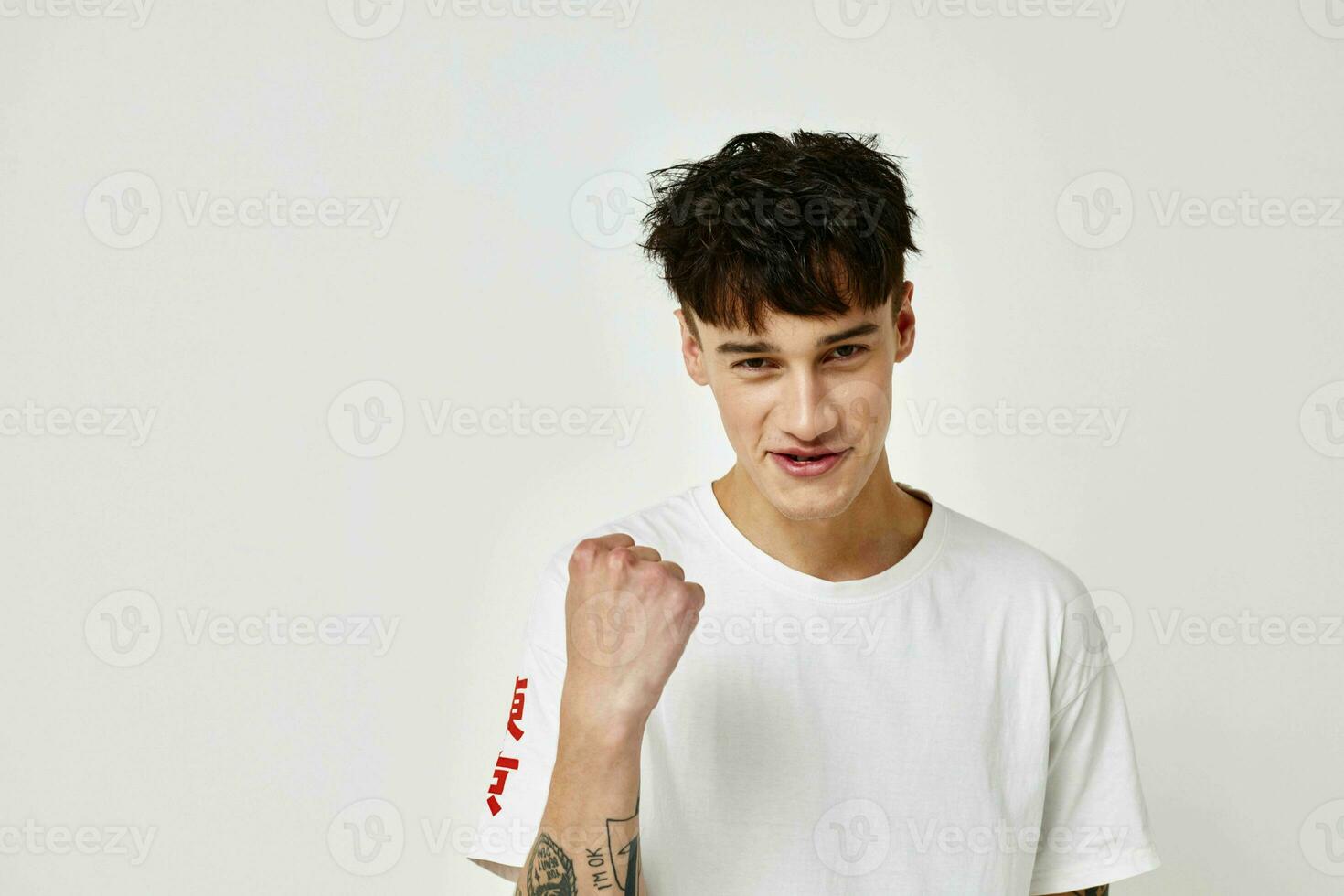 Photo young boyfriend modern youth style white t-shirt tattoo on the arm Lifestyle unaltered