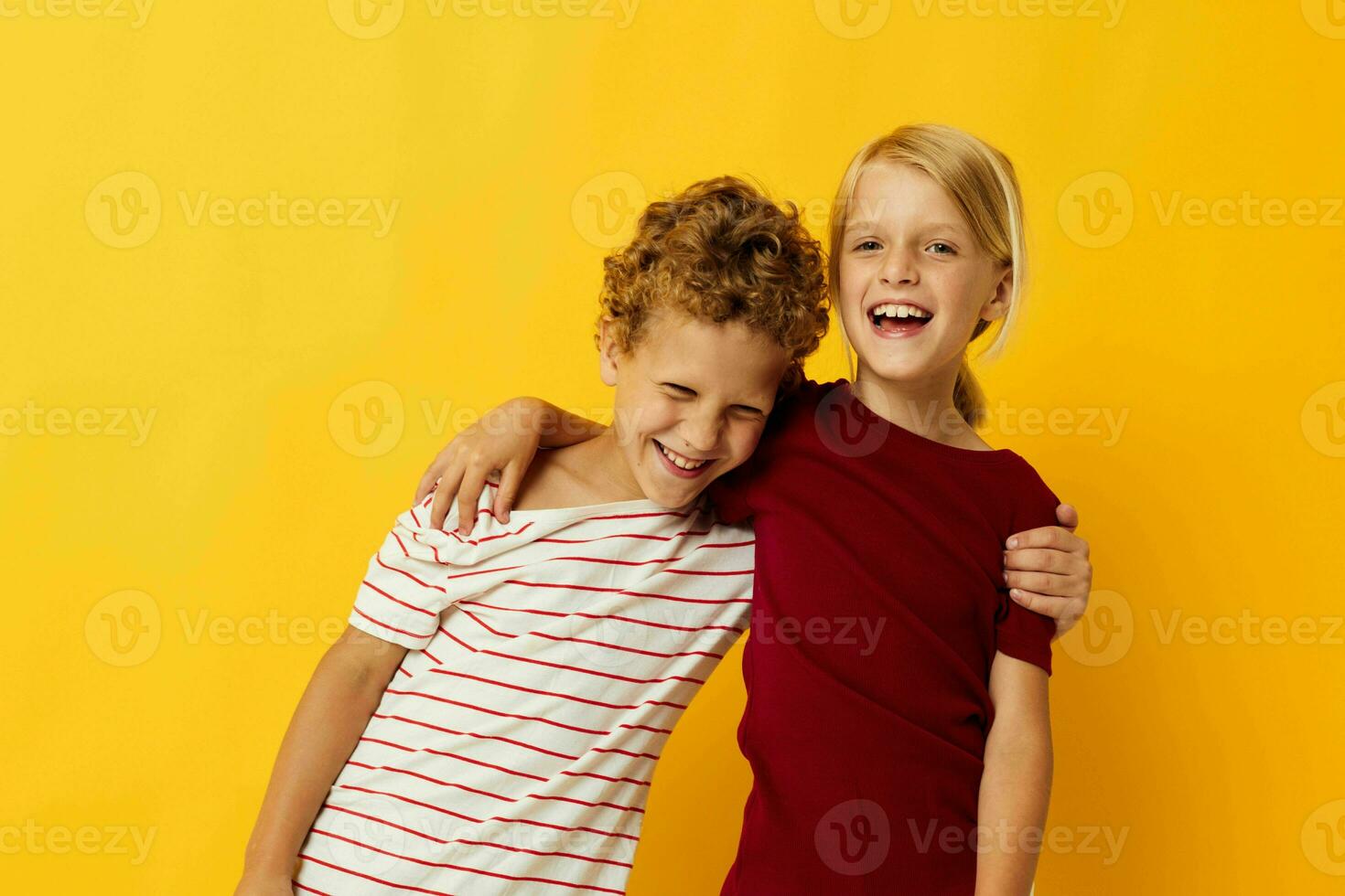 two joyful children casual wear games fun together isolated background photo