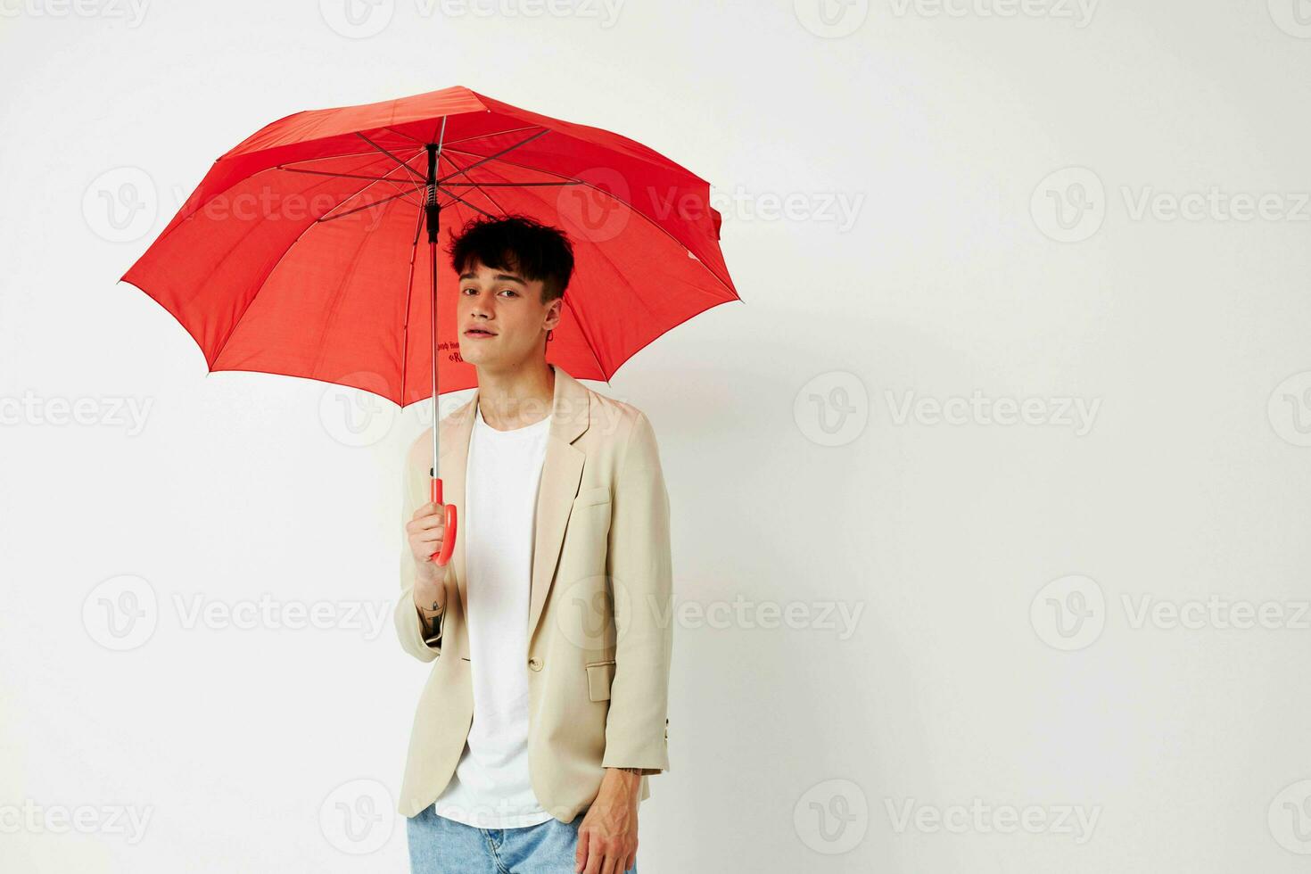 handsome guy rain protection in hand in hand modern style isolated background unaltered photo