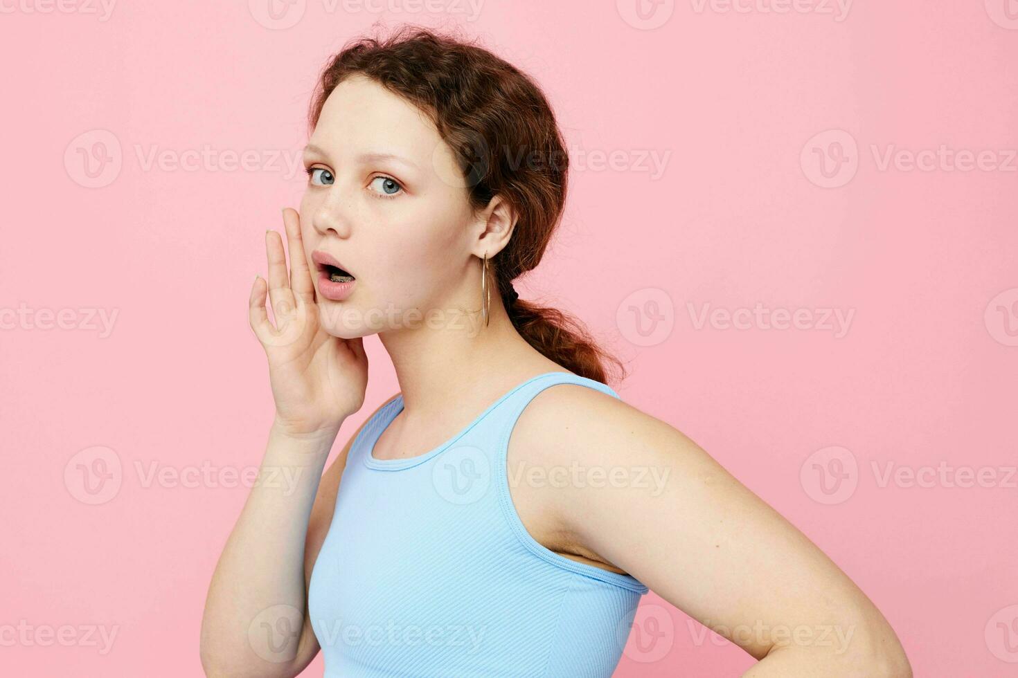 cheerful woman blue t shirt hand gestures emotion cropped view unaltered photo