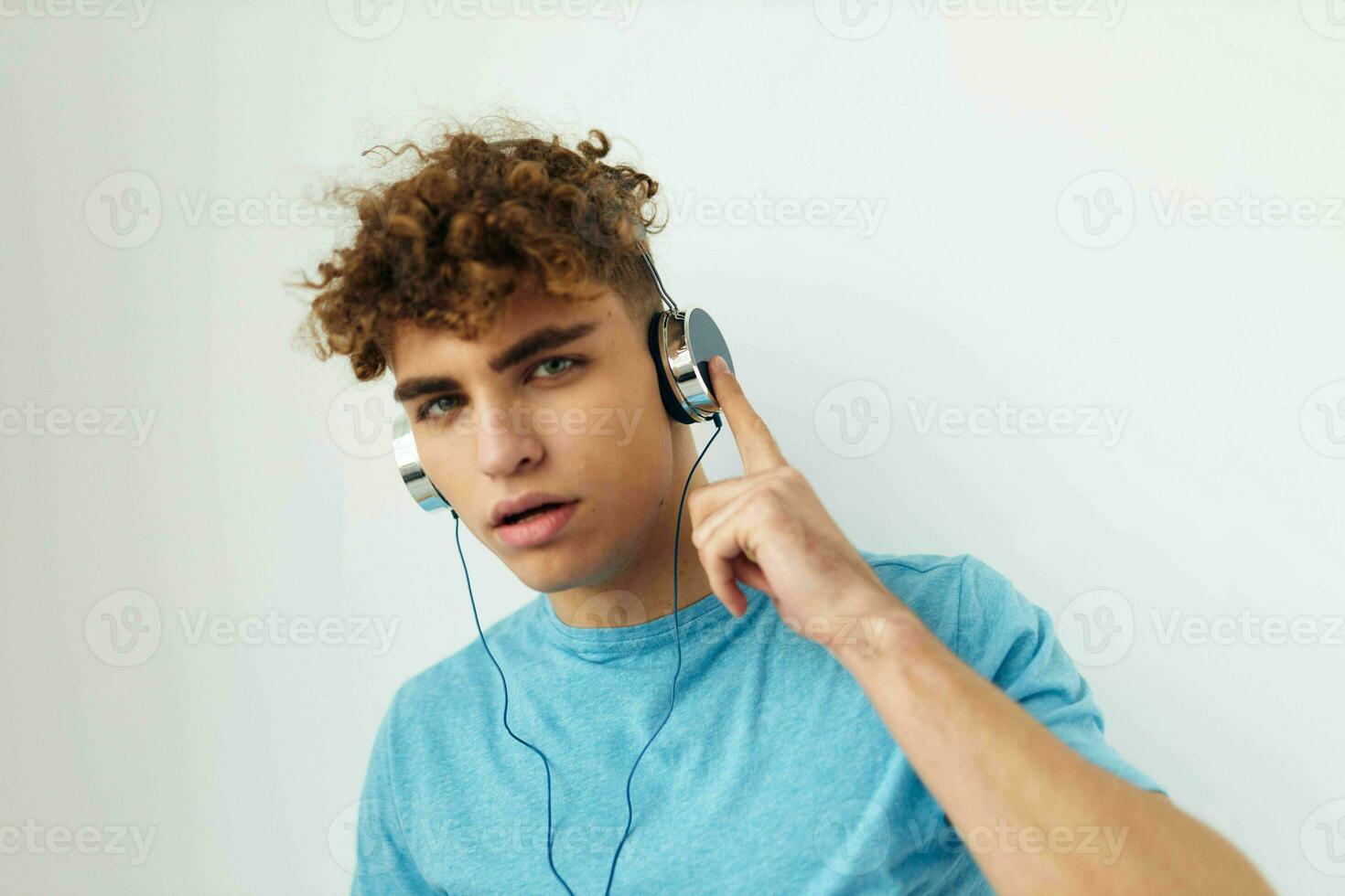 handsome guy in headphones music emotions Lifestyle unaltered photo