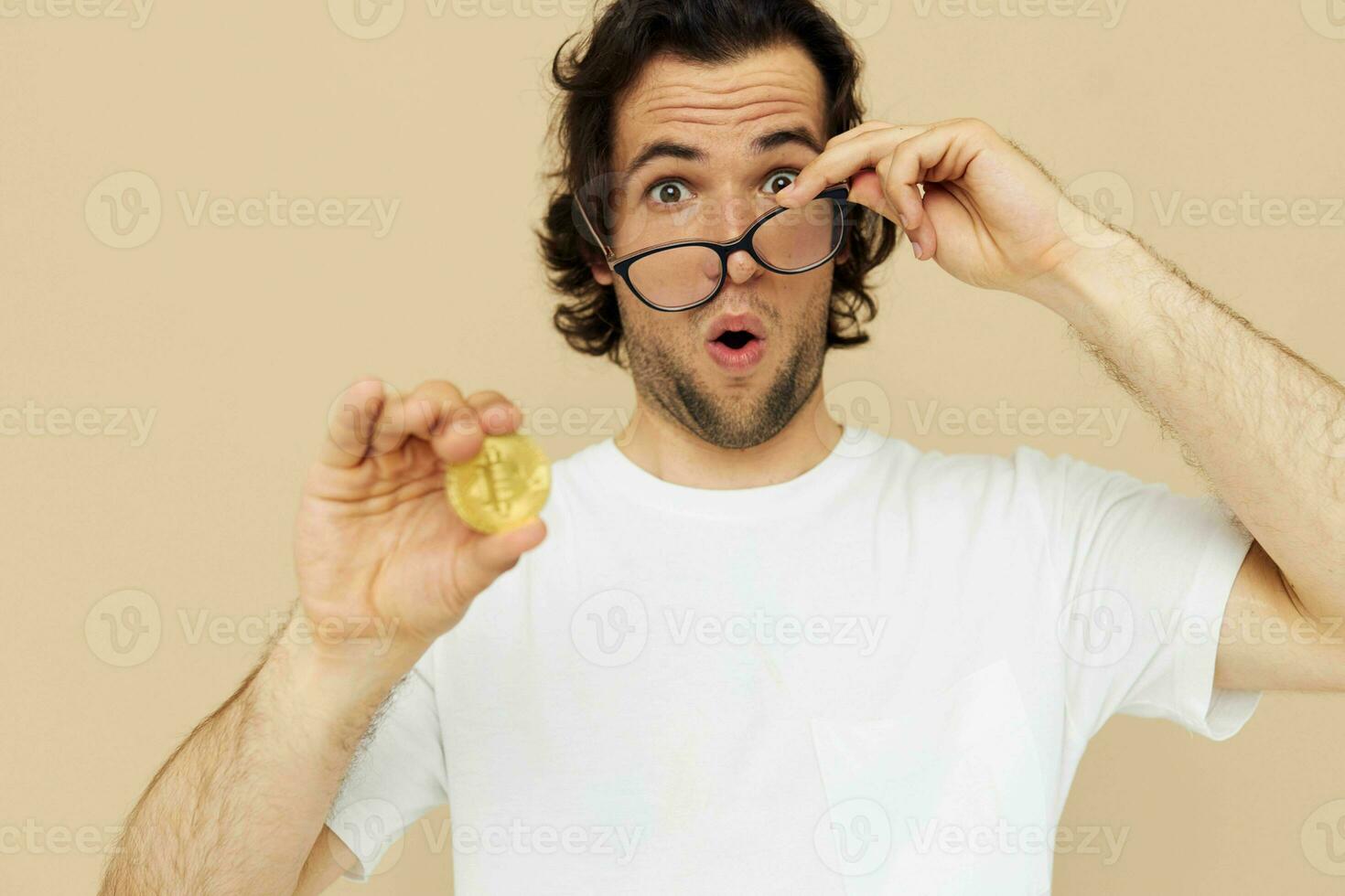 Cheerful man emotions cryptocurrency finance close-up Lifestyle unaltered photo