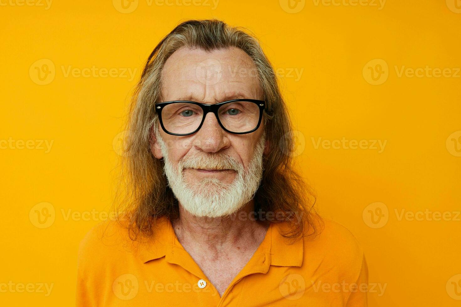cheerful elderly man with glasses gray beard close-up photo