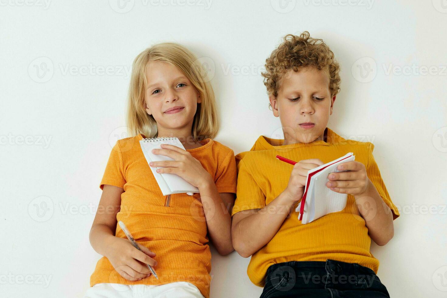 picture of positive boy and girl childhood entertainment drawing childhood lifestyle unaltered photo