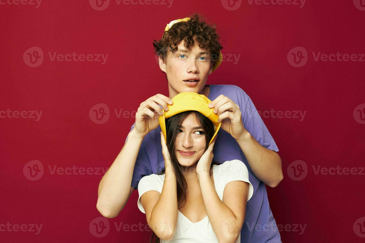 a young couple in colorful t-shirts stylish clothes hats Youth style photo