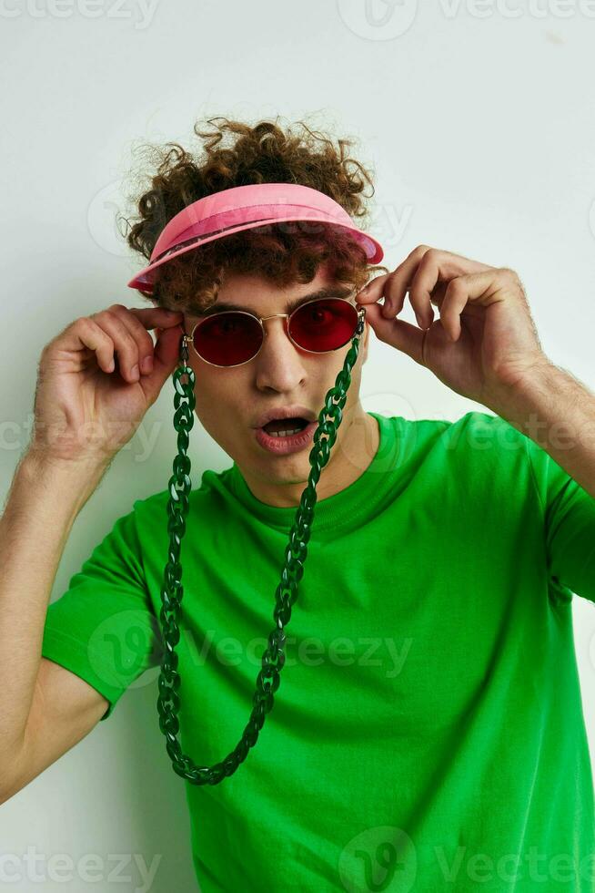 Attractive man fashion posing with glasses isolated background 25710023