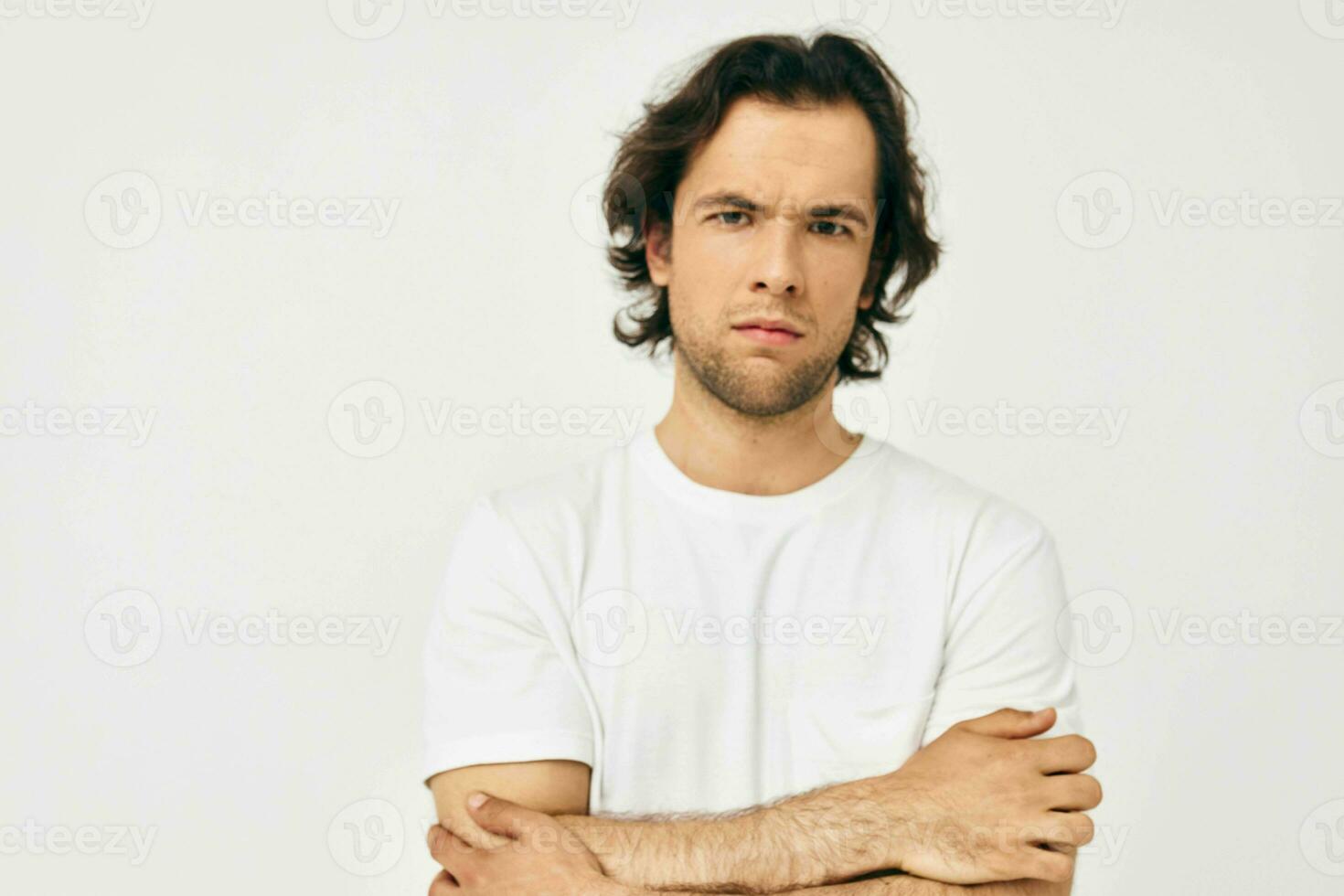 handsome man in a white T-shirt hand gesture Lifestyle unaltered photo