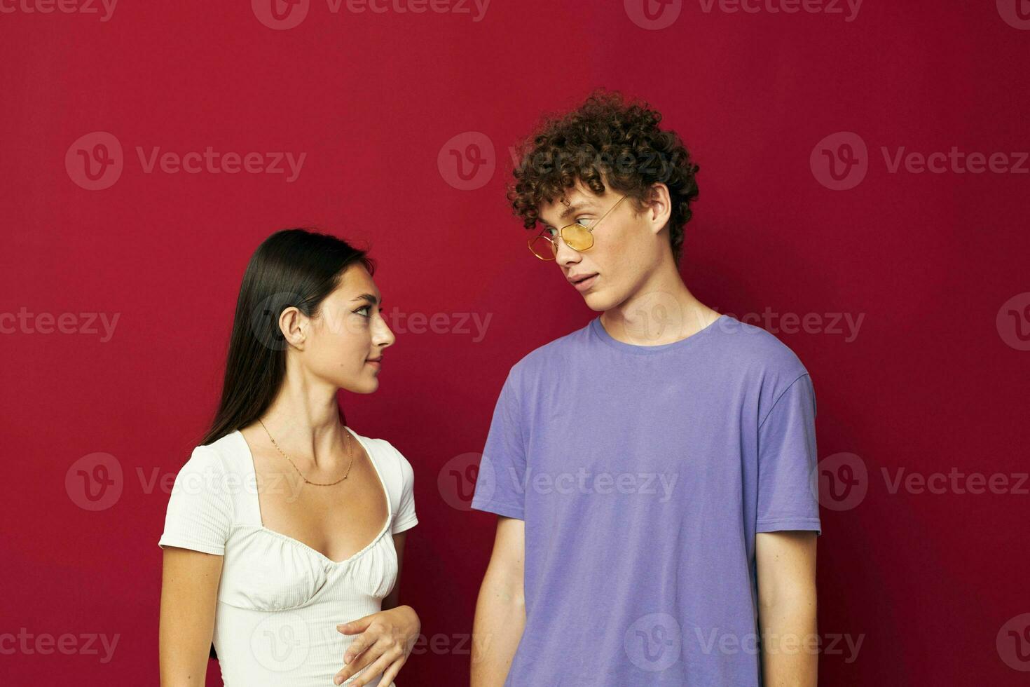 nice guy and girl hand gesture fun friendship red background photo