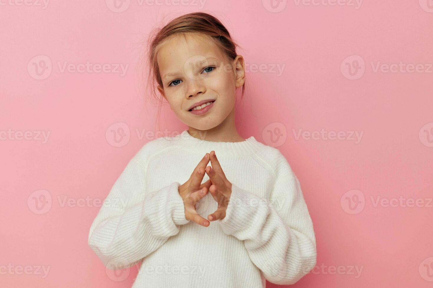 Portrait of happy smiling child girl gesture hands emotions grimace childhood unaltered photo