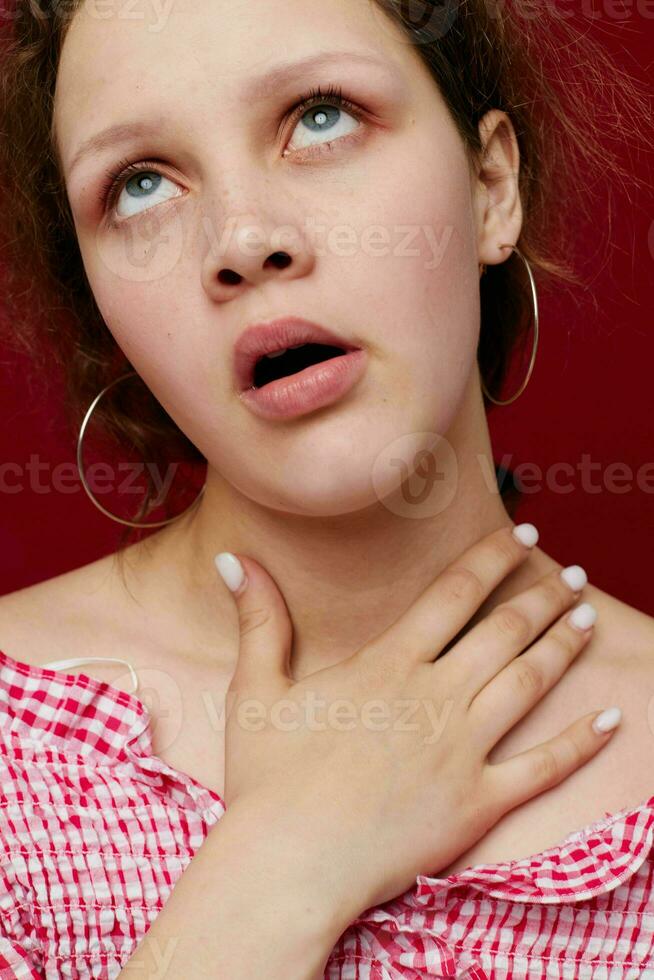 emotional woman gesturing with her hands close-up photo