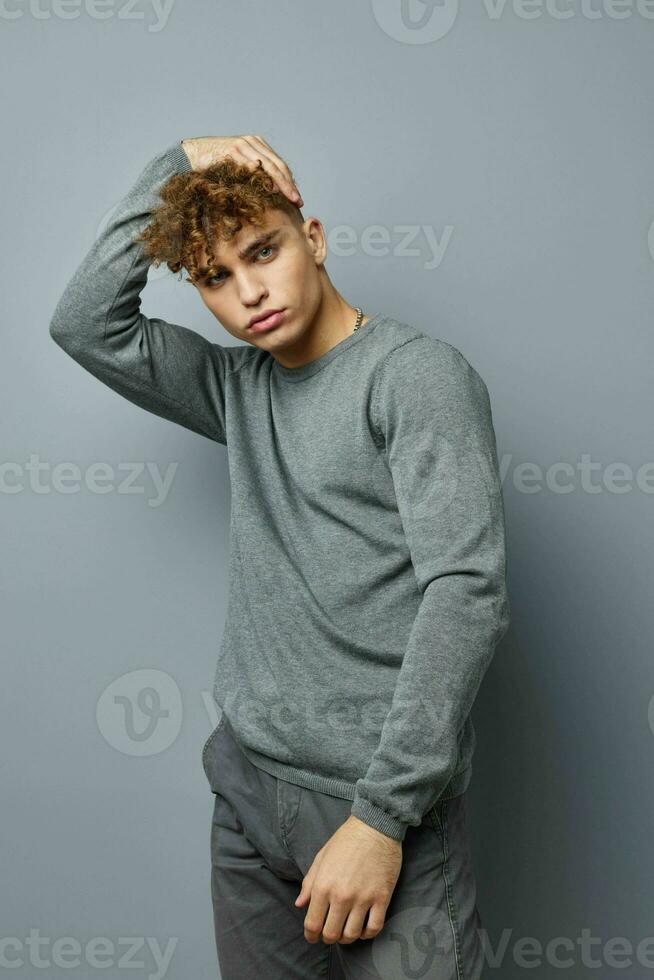 handsome young man posing stylish clothes model isolated background photo