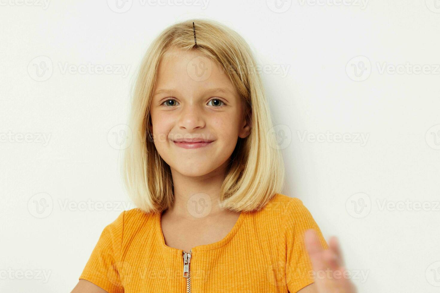 cute little girl with blond hair basing fun childhood photo