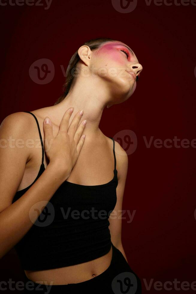 Young woman with pink makeup photo