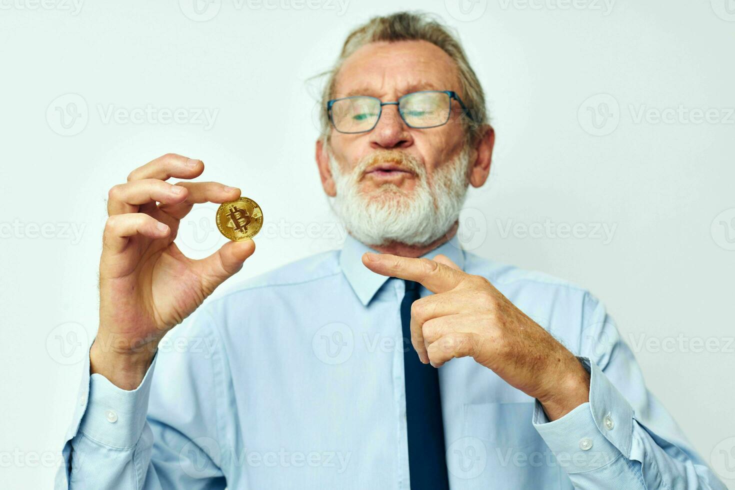 Photo of retired old man in a shirt with a tie Finance and Investments Bitcoin cropped view