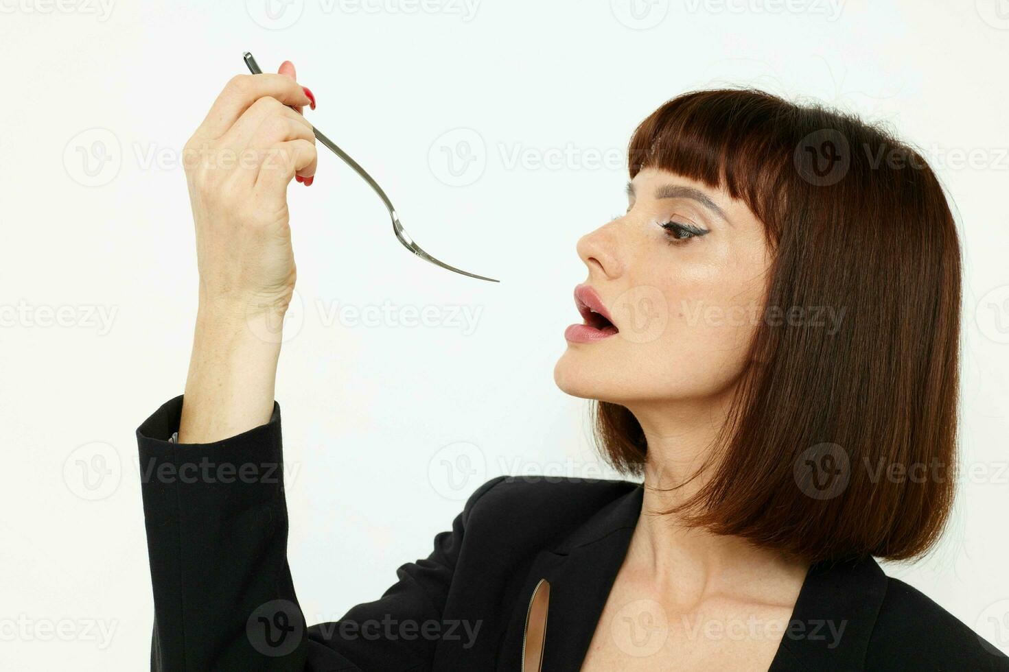 attractive woman knife and fork in hands emotions posing Lifestyle unaltered photo