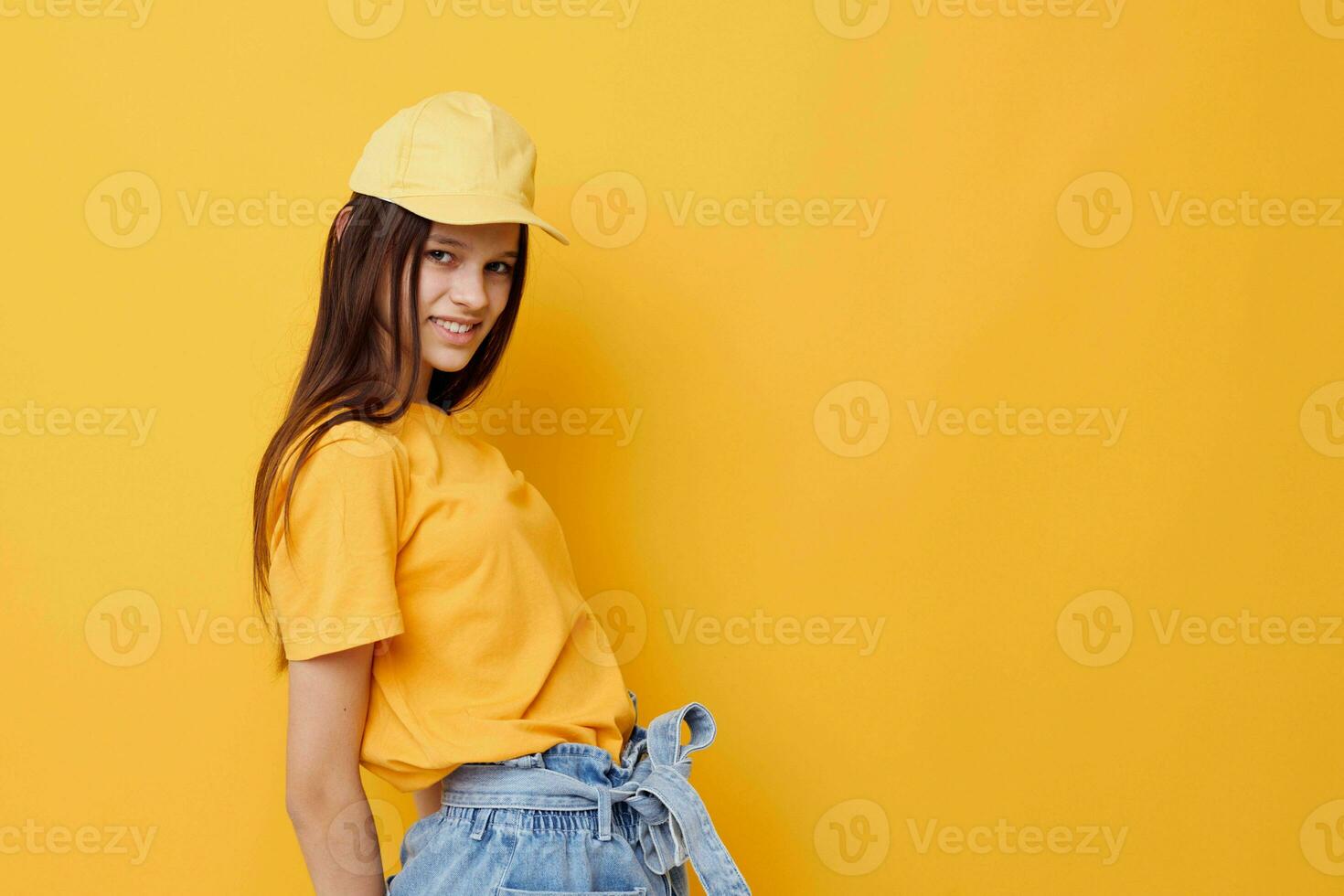 young beautiful woman hand gesture emotions summer style yellow background photo