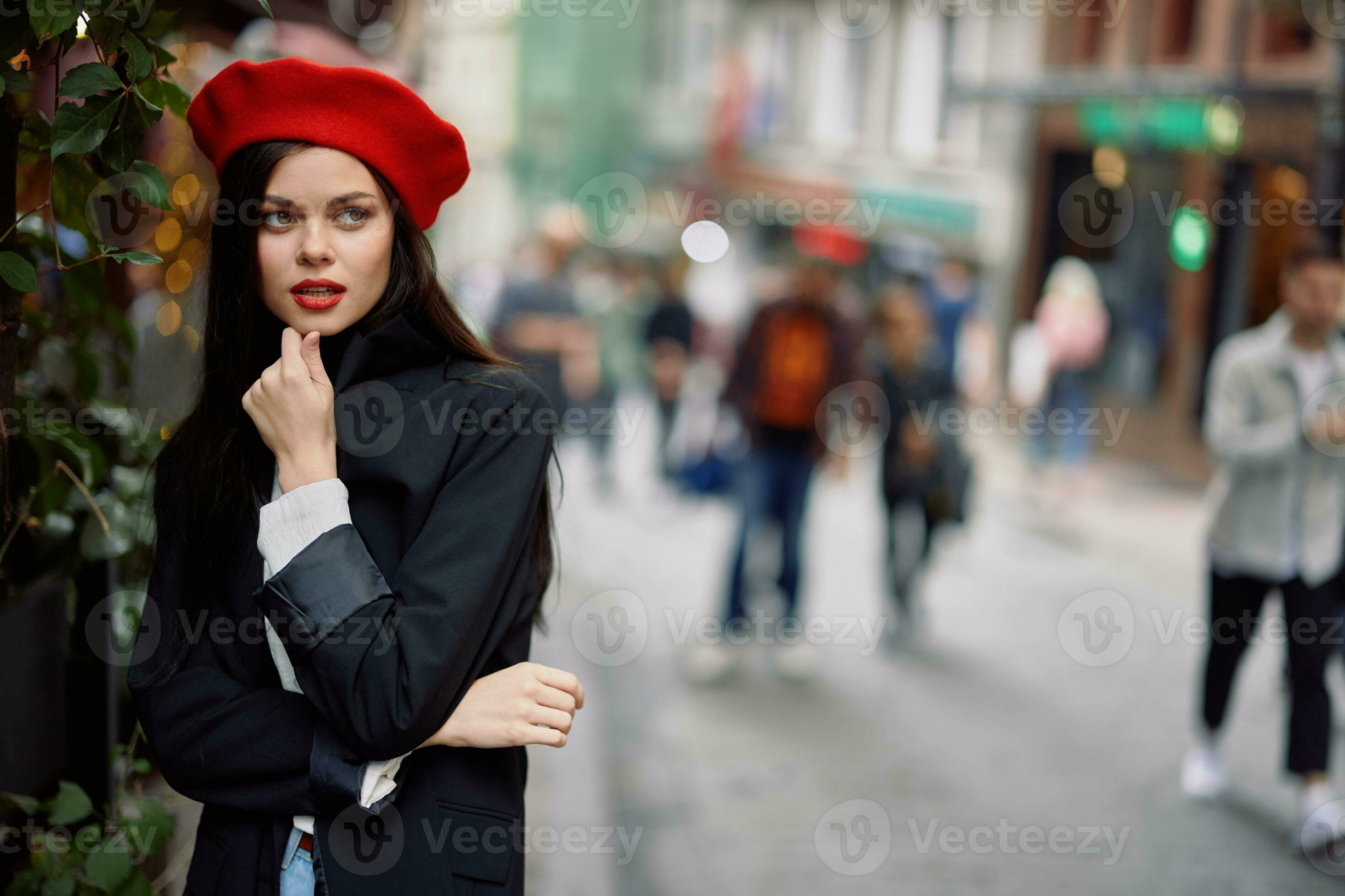 Woman walking down an old city street in a crowd, sociophobia, fear of