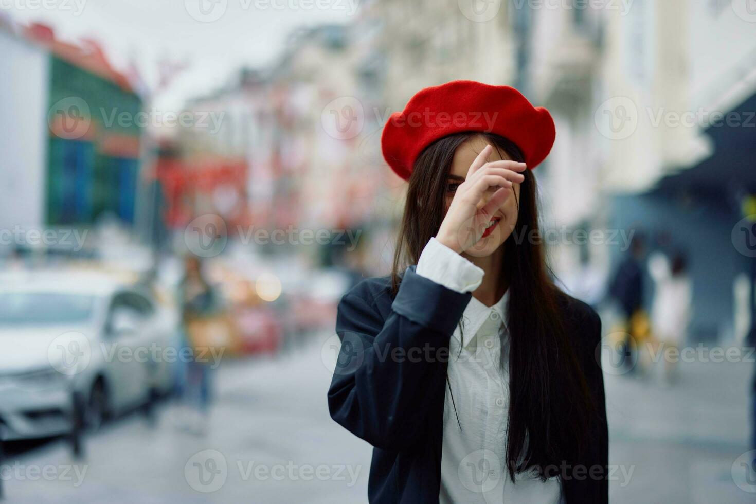 Happiness woman jumps and runs, follow me walks walks in the city against the backdrop of office buildings, stylish fashionable vintage clothes and make-up, spring walk, travel. photo