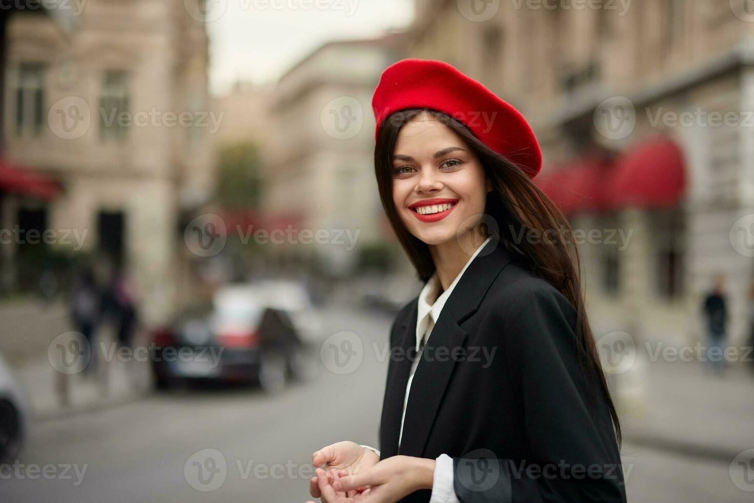 Fashion woman portrait smile teeth standing on the street in the city background in stylish clothes with red lips and red beret, travel, cinematic color, retro vintage style, urban fashion lifestyle. photo