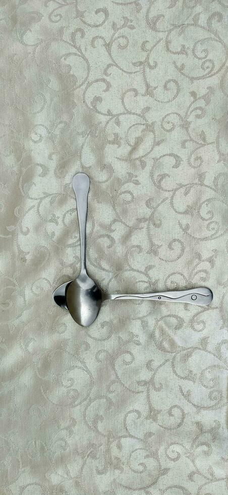 Kitchen spoon with chrome color from metal photo