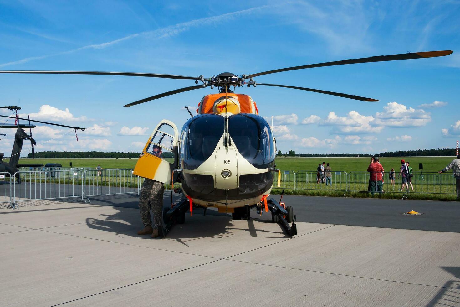 Military helicopter at air base. Air force flight transportation. Aviation and rotorcraft. Transport and airlift. Military industry. Fly and flying. photo