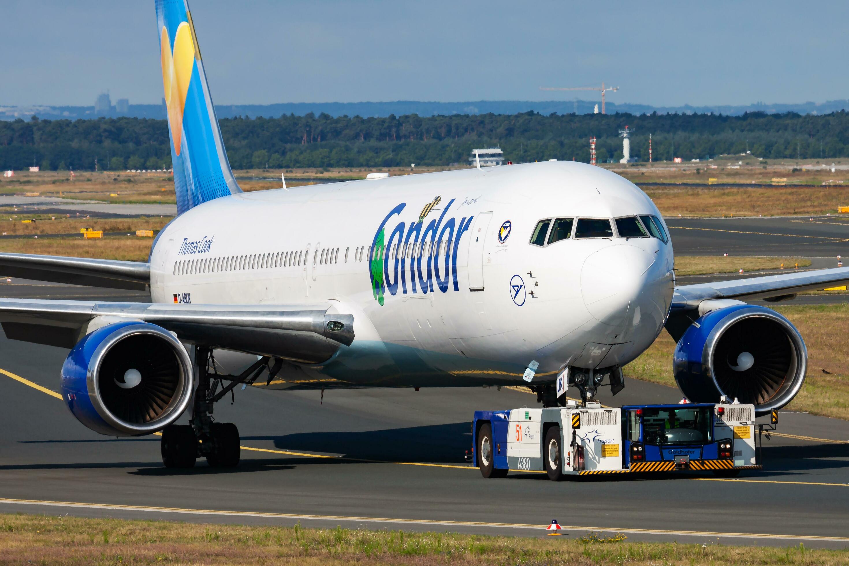 Condor passenger plane at airport. Schedule flight travel. Aviation and