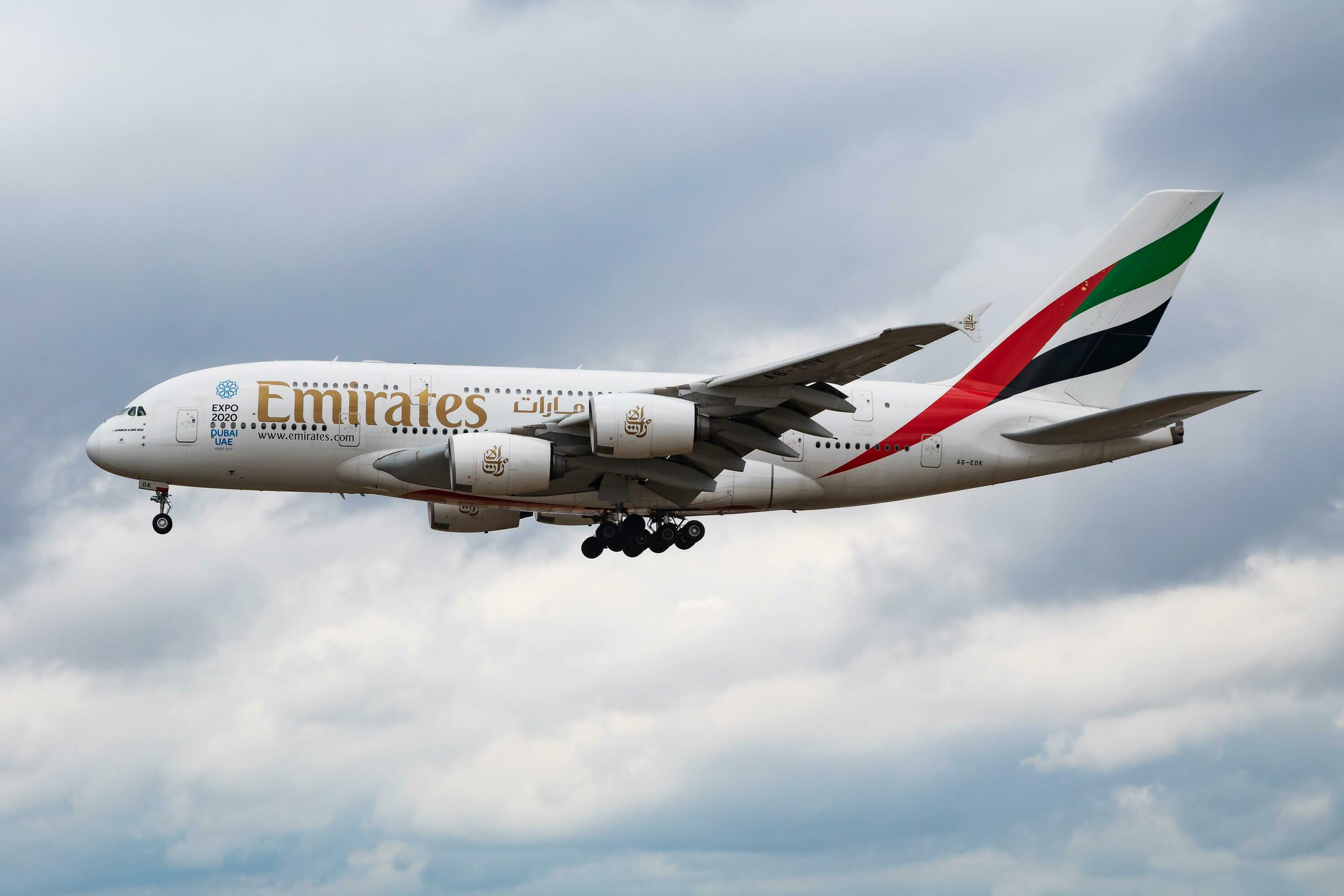 Emirates Airlines passenger plane at airport. Schedule flight travel