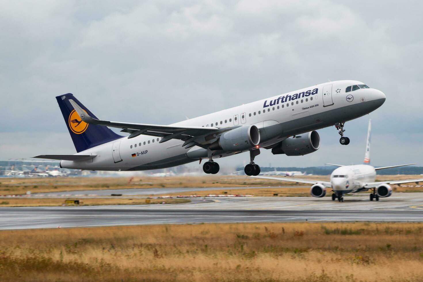 Lufthansa passenger plane at airport. Schedule flight travel. Aviation