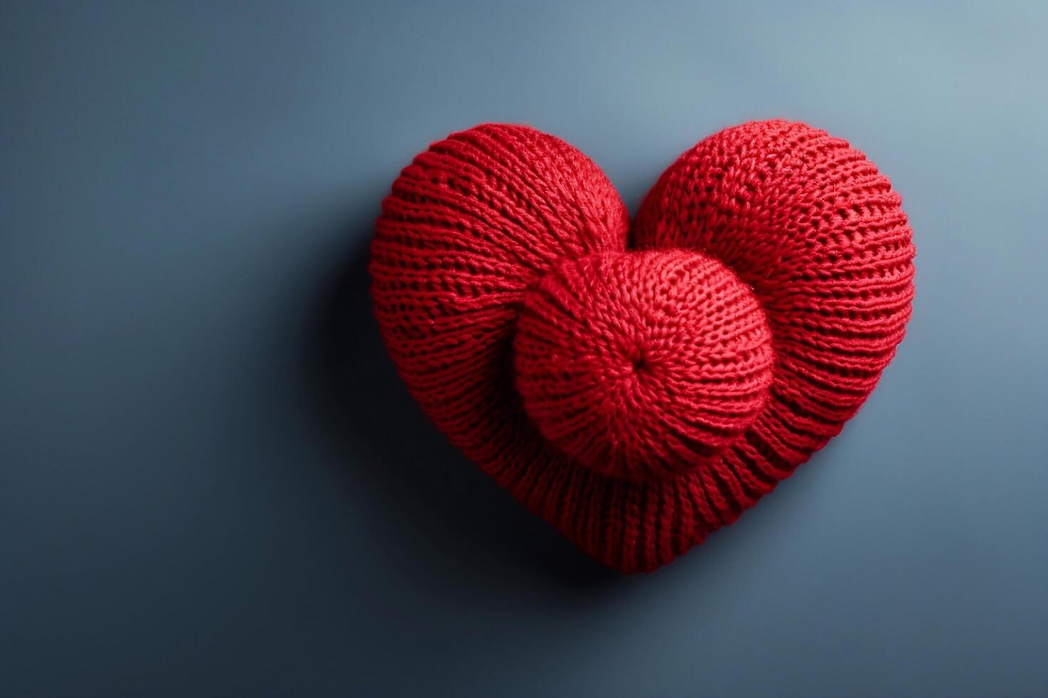 Photo of red Heart on table focus of heart with light and dark background. Valentines day concept.