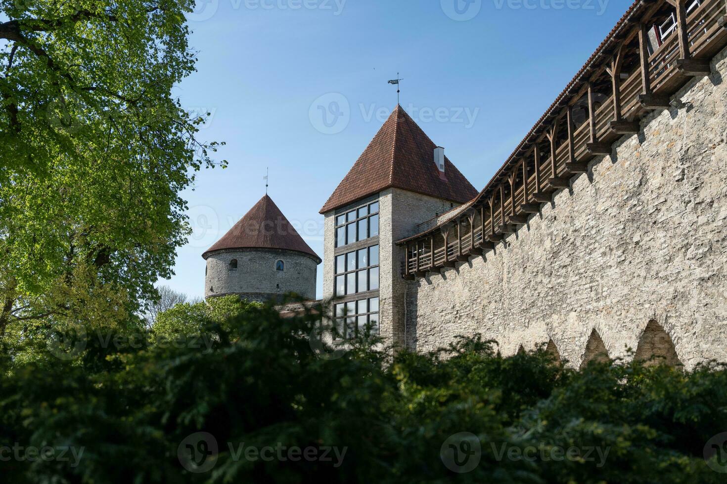 City wall and defense towers at Danish Kings Garden in Tallinn photo