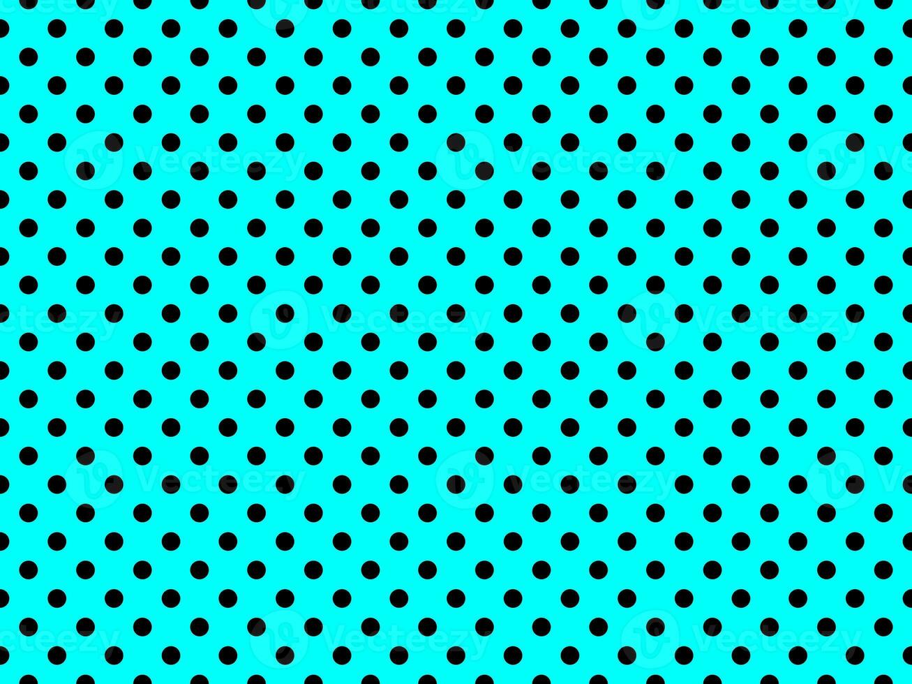 black polka dots over aqua background photo