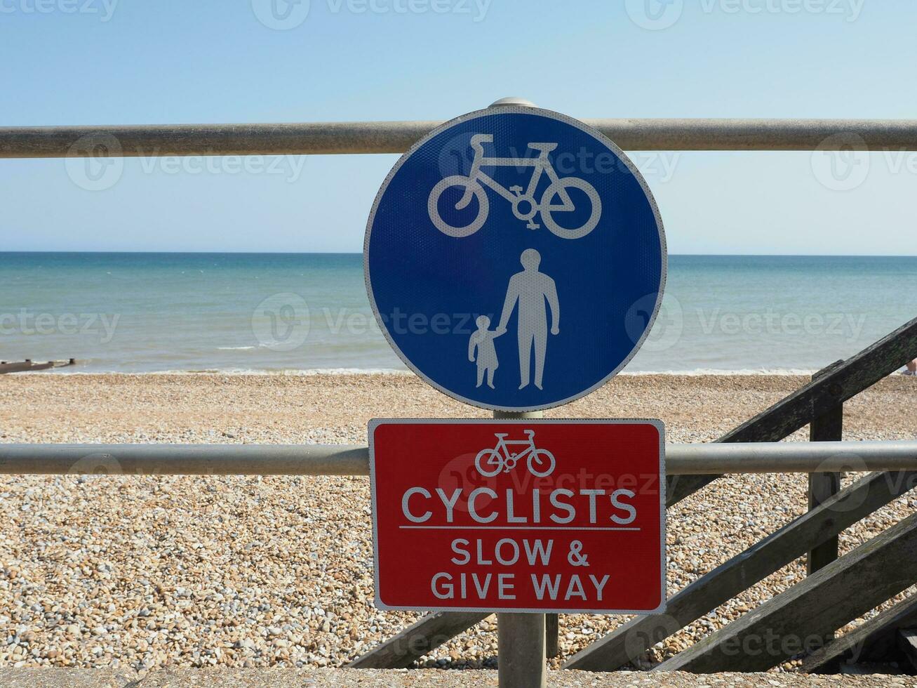 cyclists slow and give way sign photo