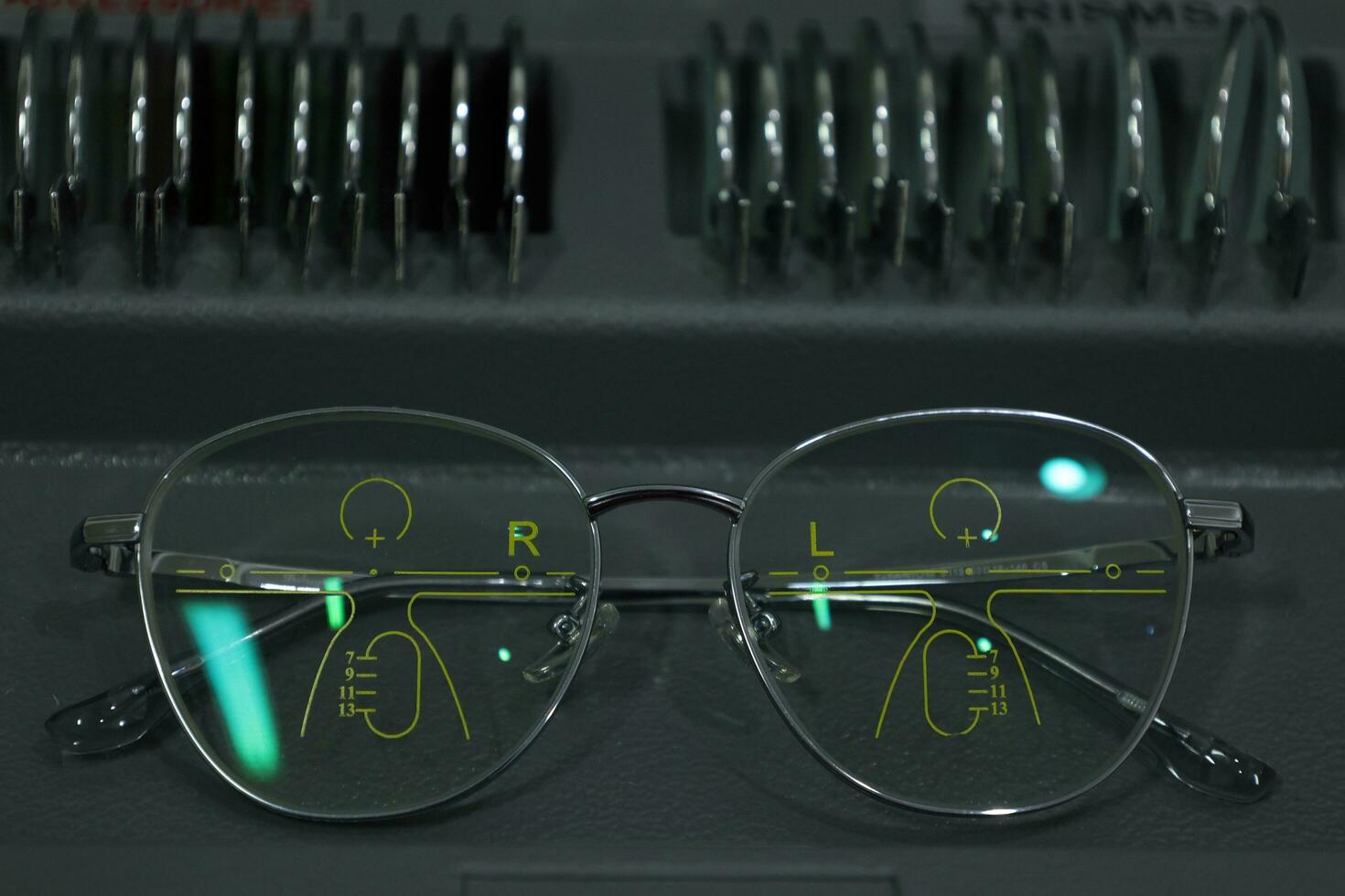 Close-up of glasses, eyeglass progressive lenses photo