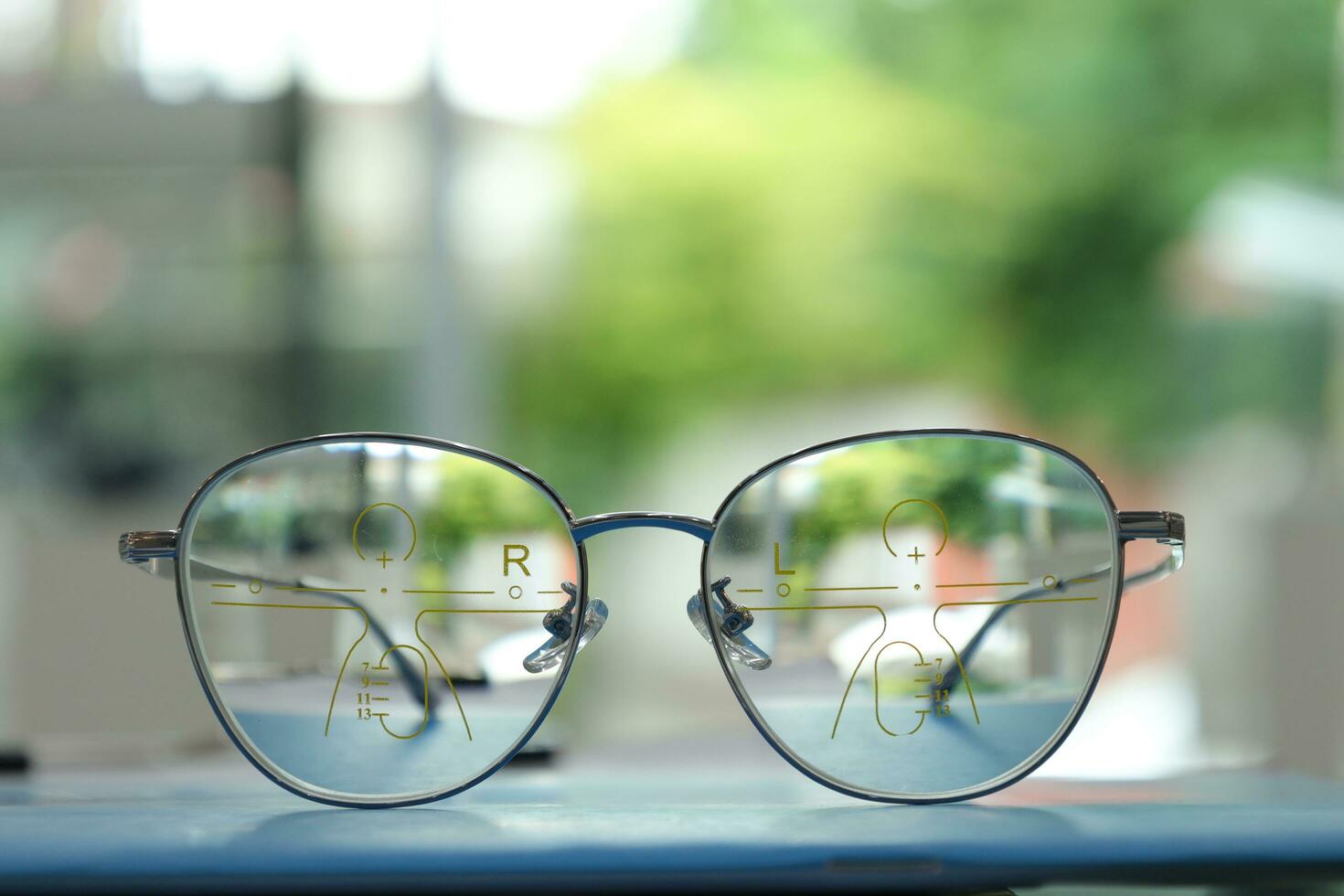 Close-up of glasses, eyeglass progressive lenses photo