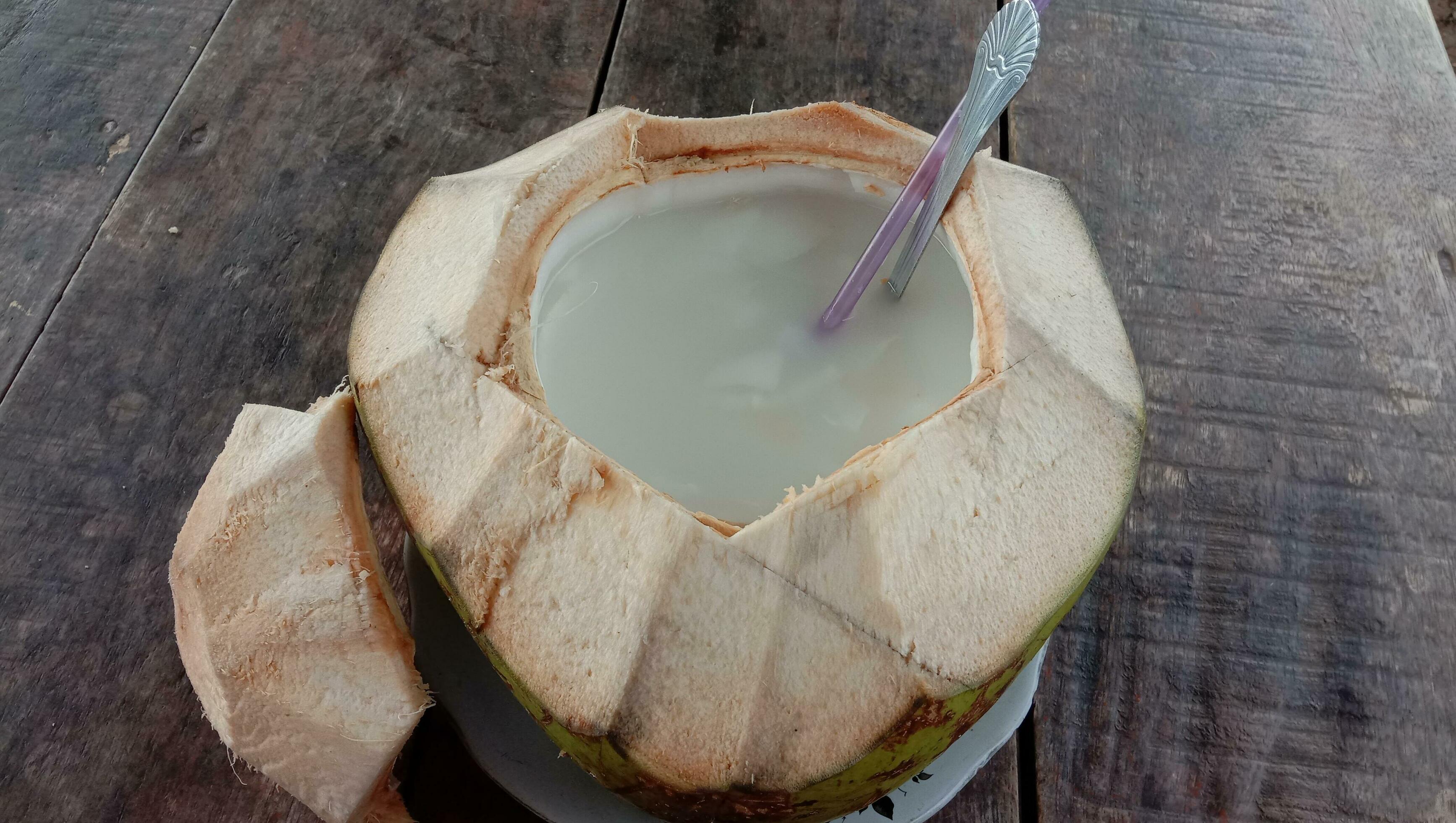 fresh young coconut drink with sugar and condensed milk 25744274 Stock Photo at Vecteezy