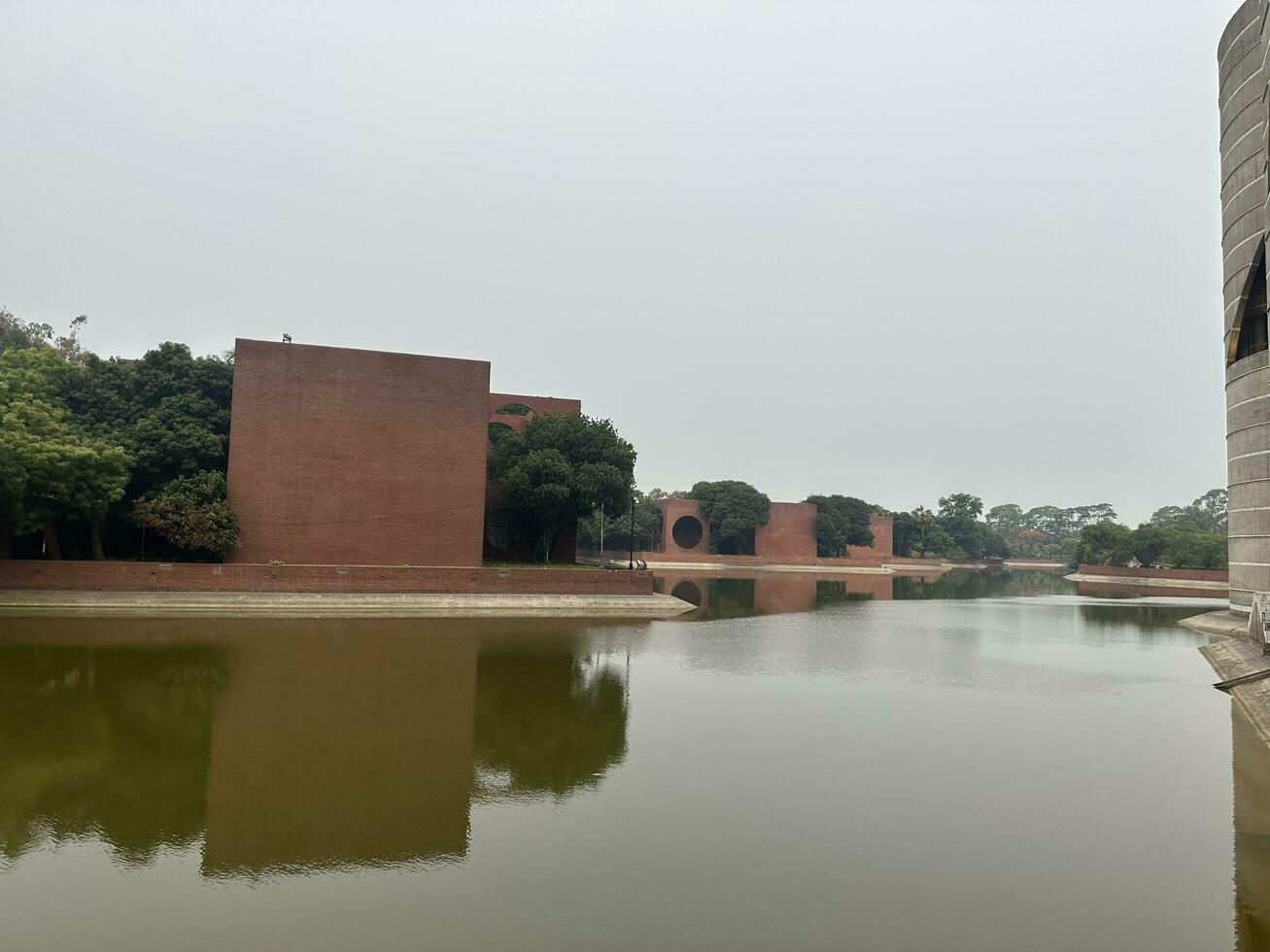 he Bangladesh National Parliament is located in the capital city of Dhaka. photo