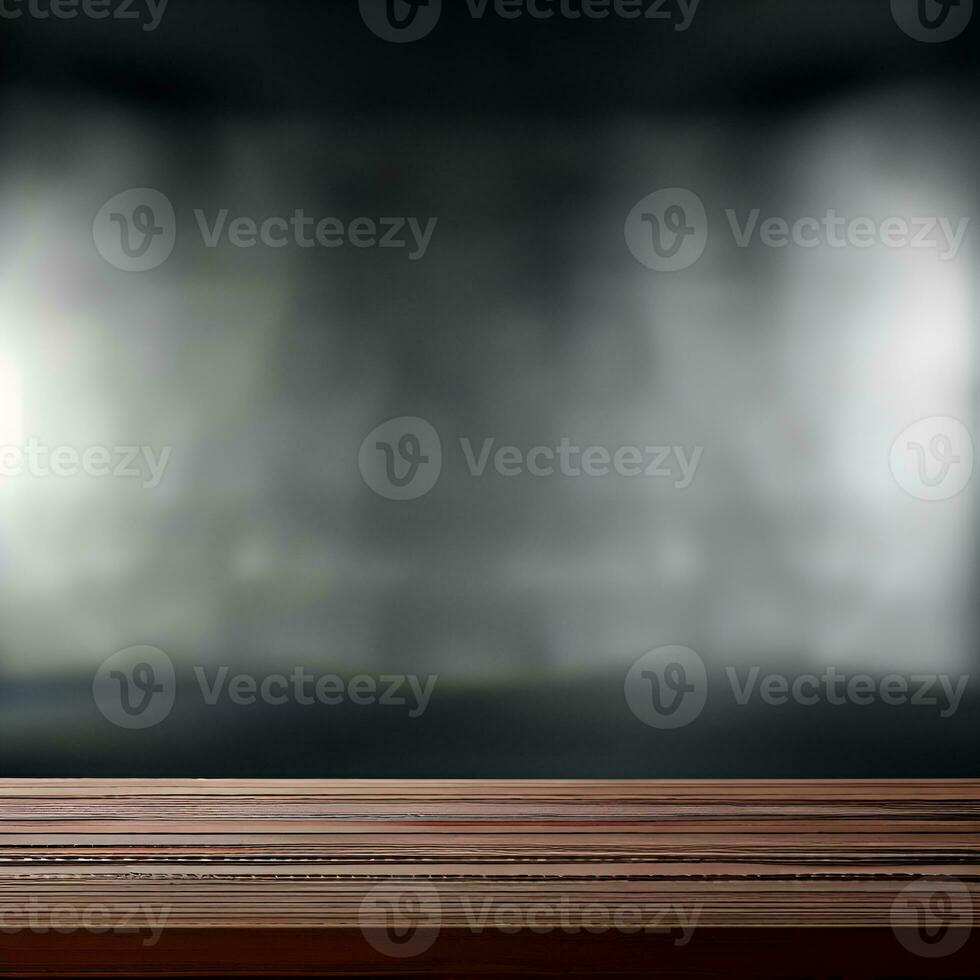 empty wooden table with smoke float up on dark background photo