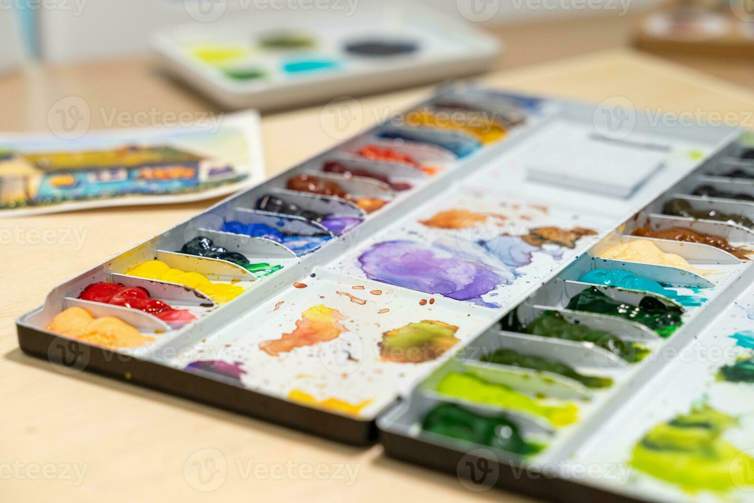 Colorful of watercolor tray background with watercolor set. Selective focus. photo