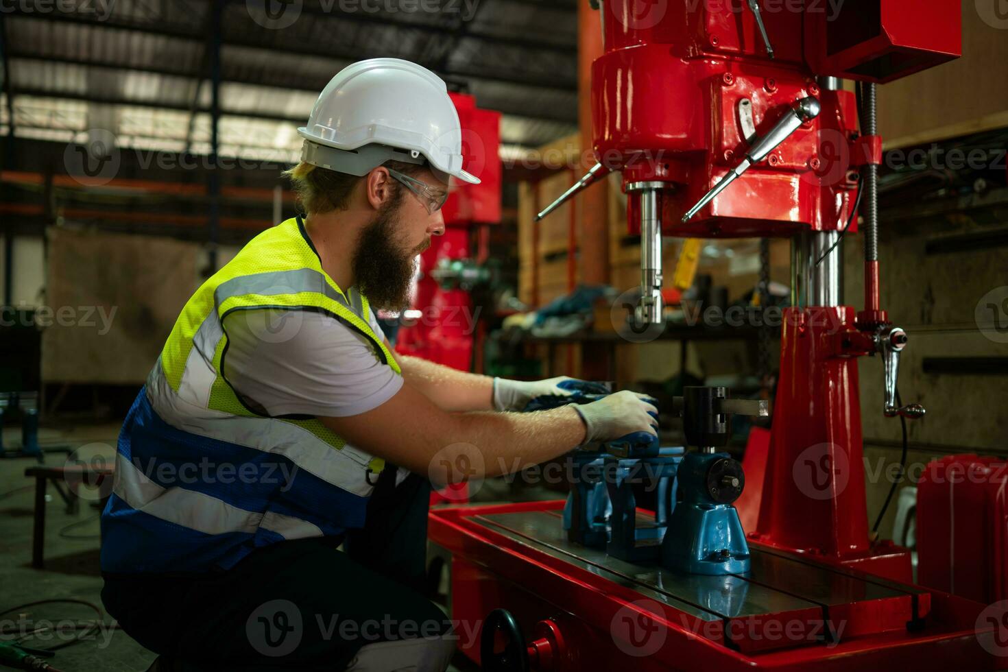 Mechanical engineers are checking the working condition of the new machine after completing the installation photo