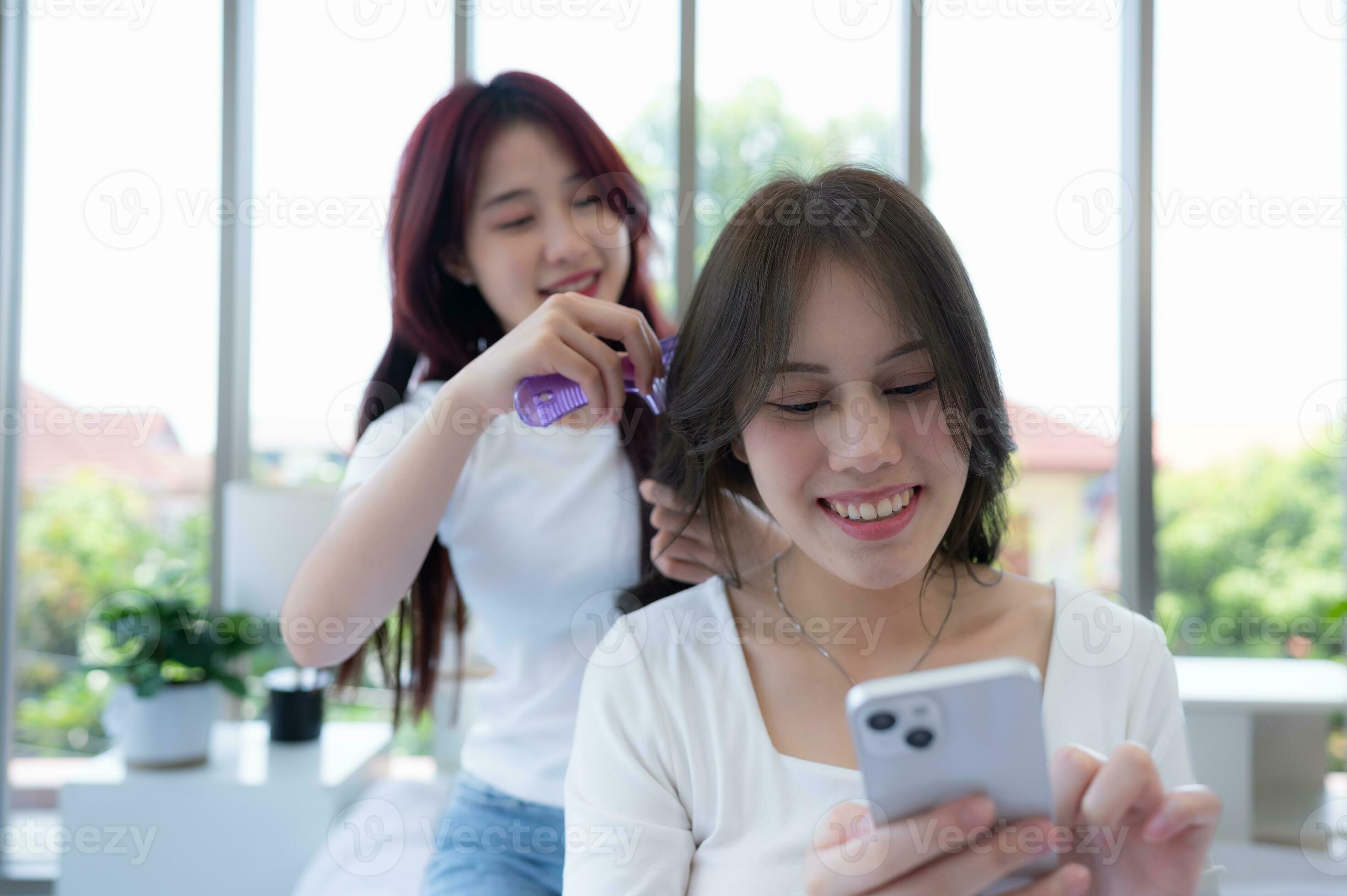 LGBT couple helping couple comb their hair after waking up take a