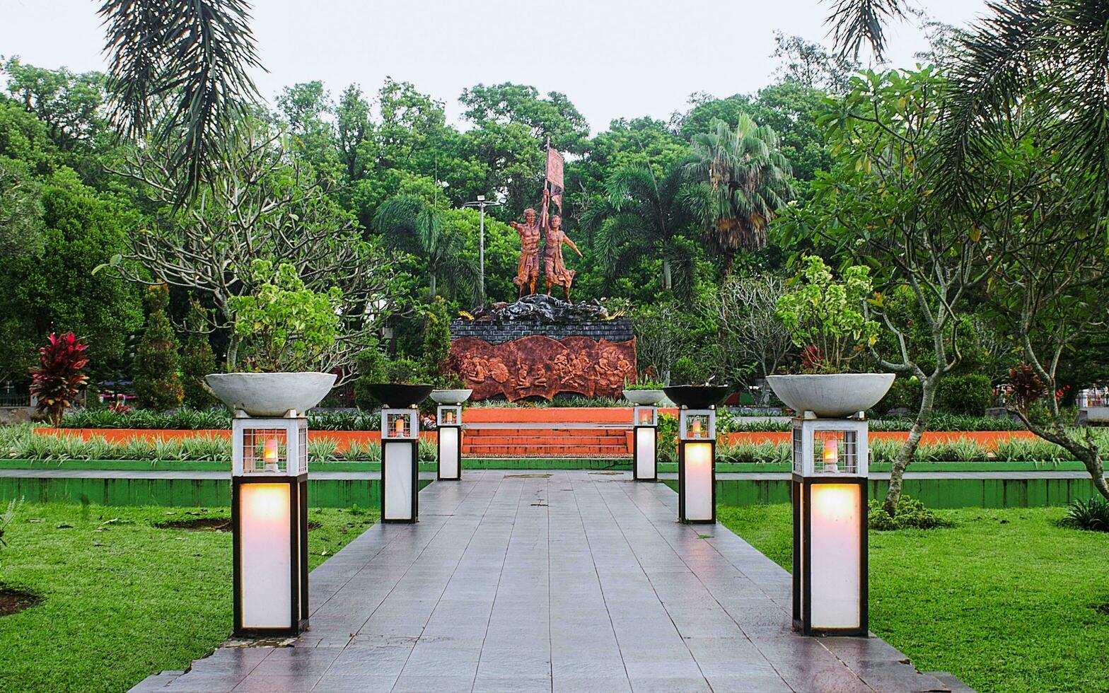 Tasikmalaya, Indonesia, November 20, 2022, Mak Eroh and Abdul Rozak Monument in Tasikmalaya City Park, the monument was erected as a form of appreciation and their struggle as farmers photo