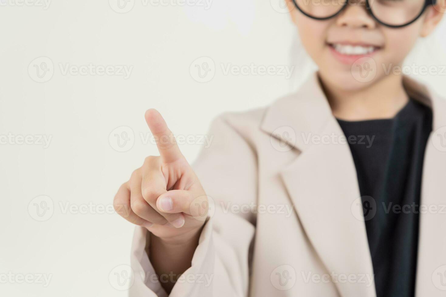 Little business lady Asia. formalwear pointing at the front standing on a white background photo