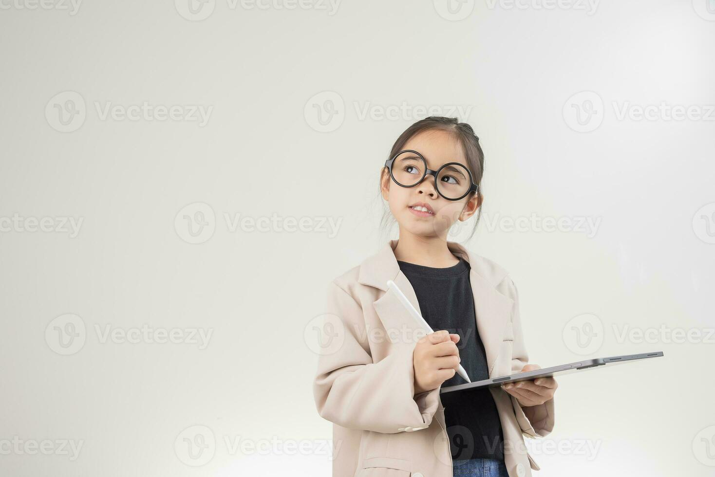 Little business lady Asia. formalwear standing on a white background photo