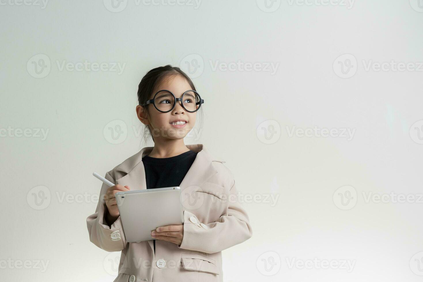 Little business lady Asia. formalwear standing on a white background photo