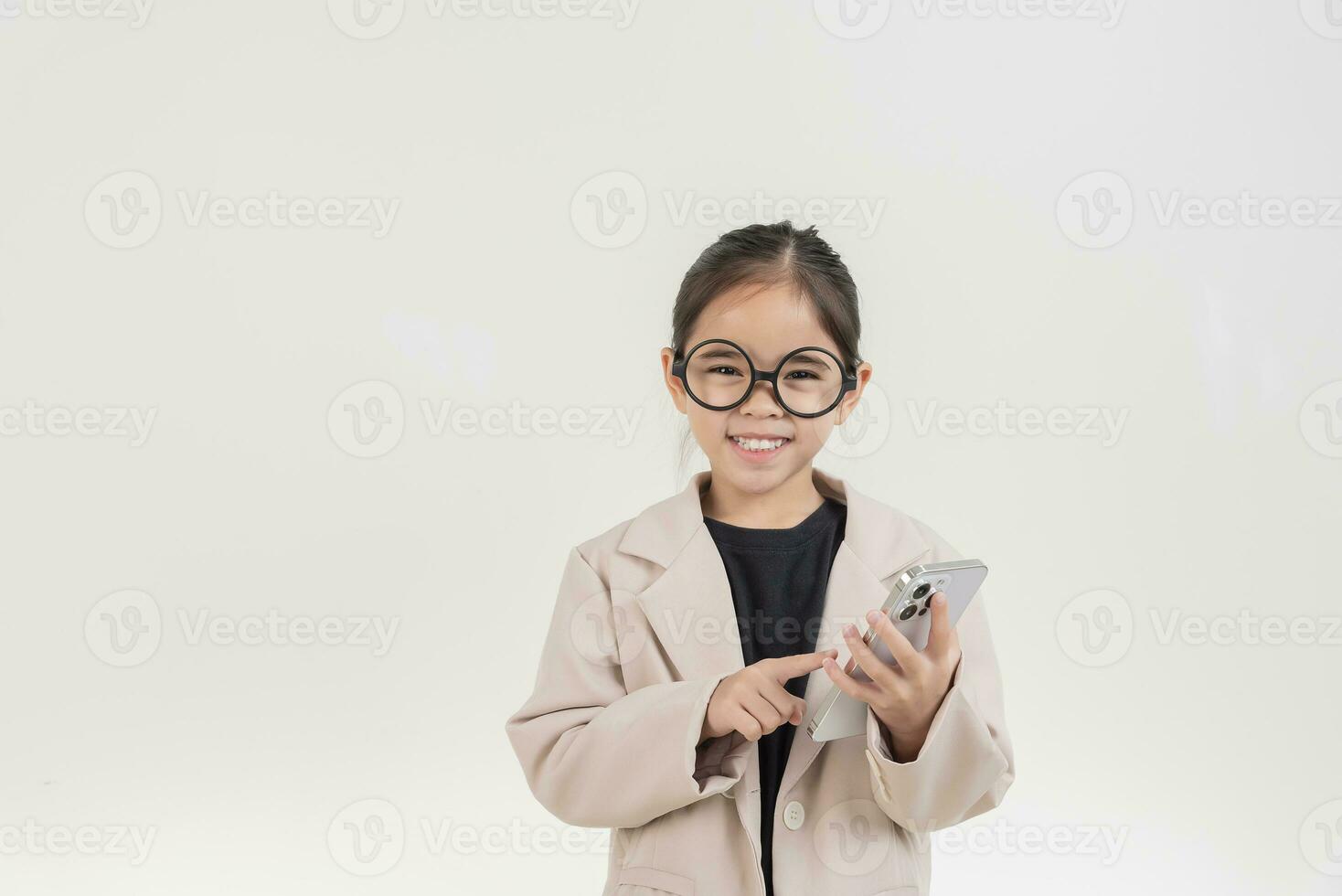 Little business lady Asia. formalwear using a mobile phone on a white background photo