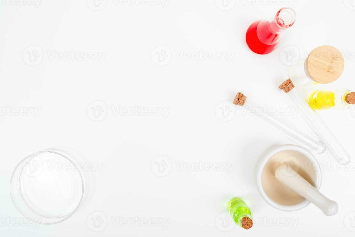 Top view science lab chemistry flask with beakers, flasks, and test tubes filled with colorful liquids photo