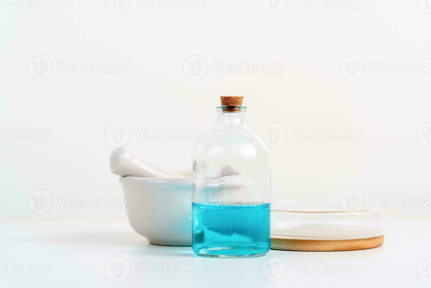 some test tube on the white table with beakers, flasks, and test tubes filled with colorful liquids photo